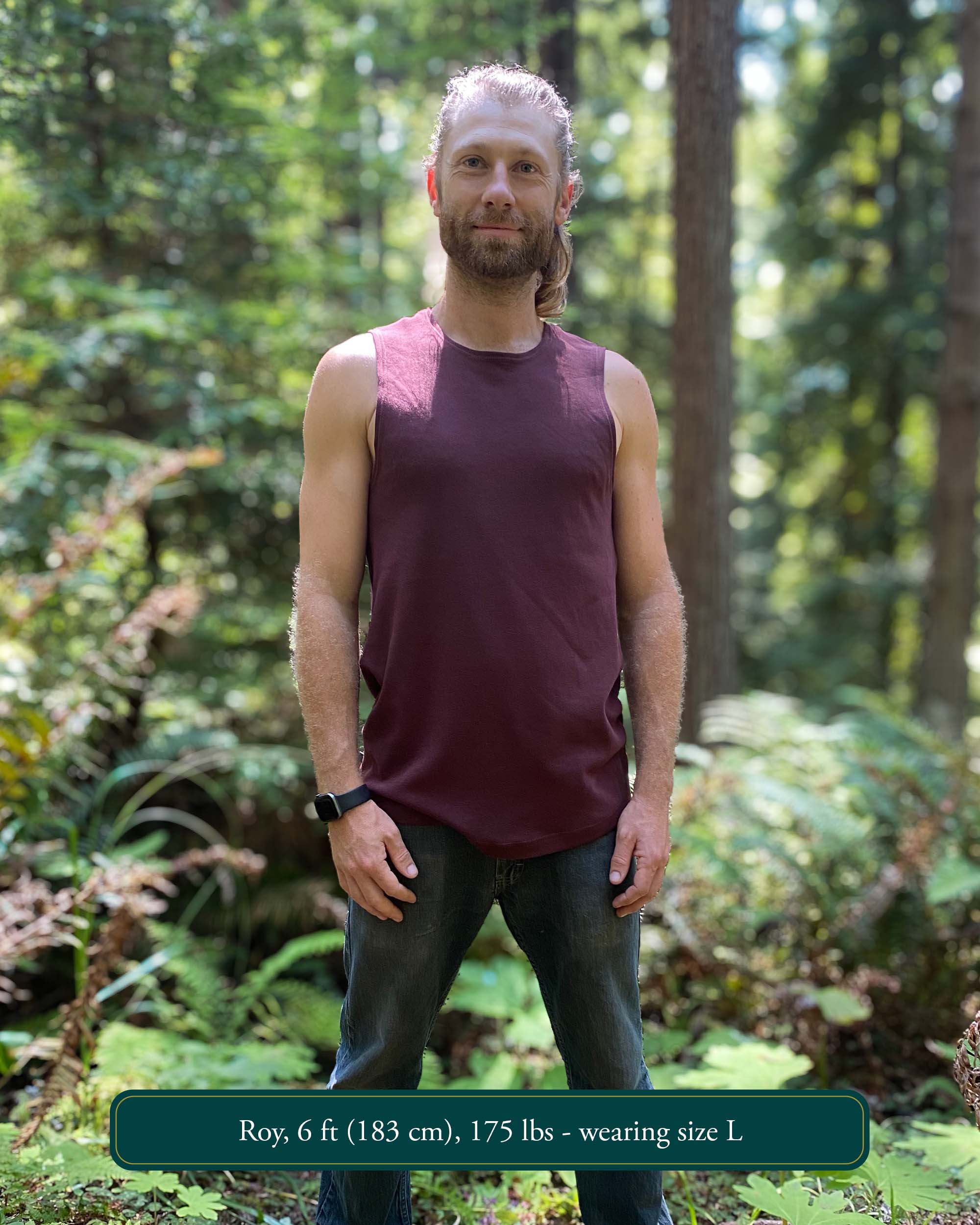 Organic cotton mens tank top, brown fabric, front view on model in nature.