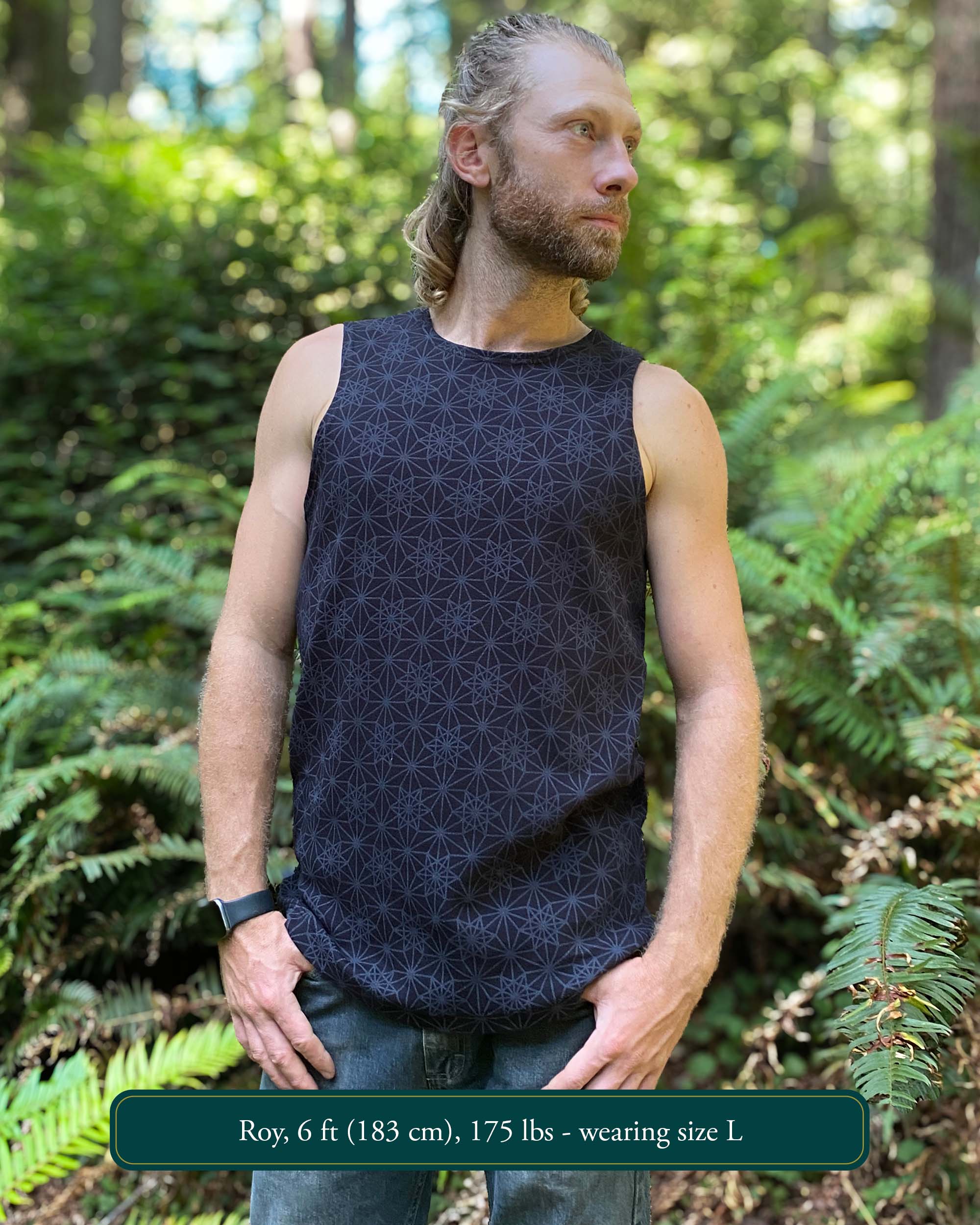 Organic cotton mens tank top, black fabric with geometric print, front view.