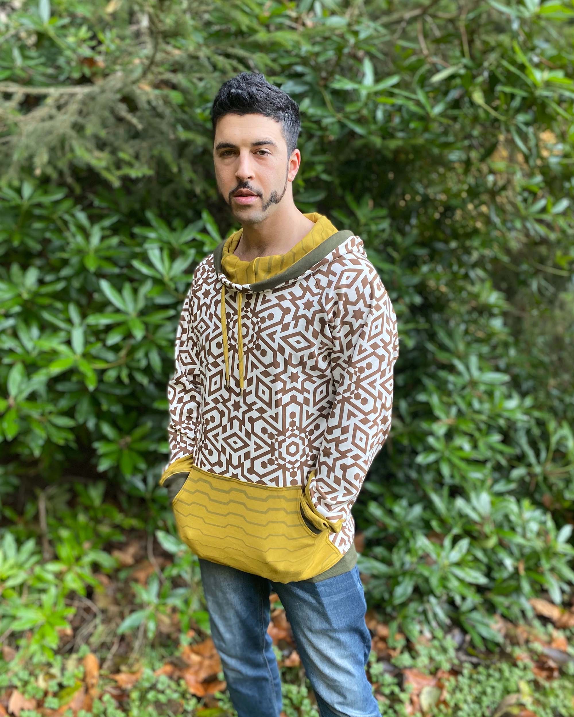 Organic cotton hoodie, un-dyed fabric with brown geo print with yellow and green accents.