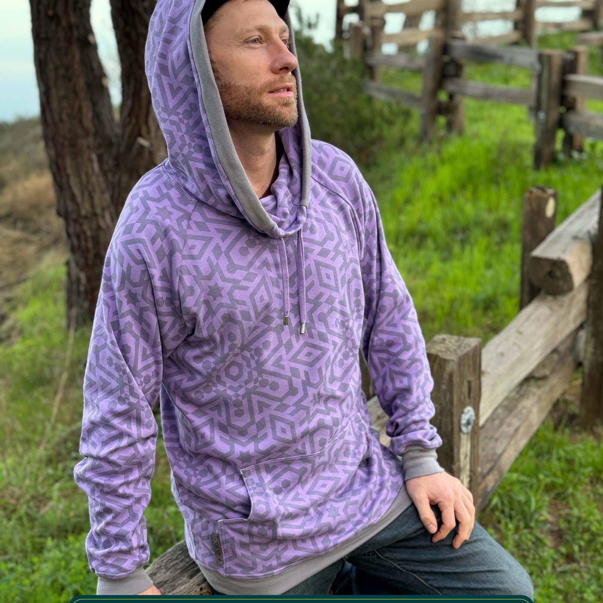 Organic cotton extra long unisex hoodie, lavender with sacred geometry print, right view of male model.