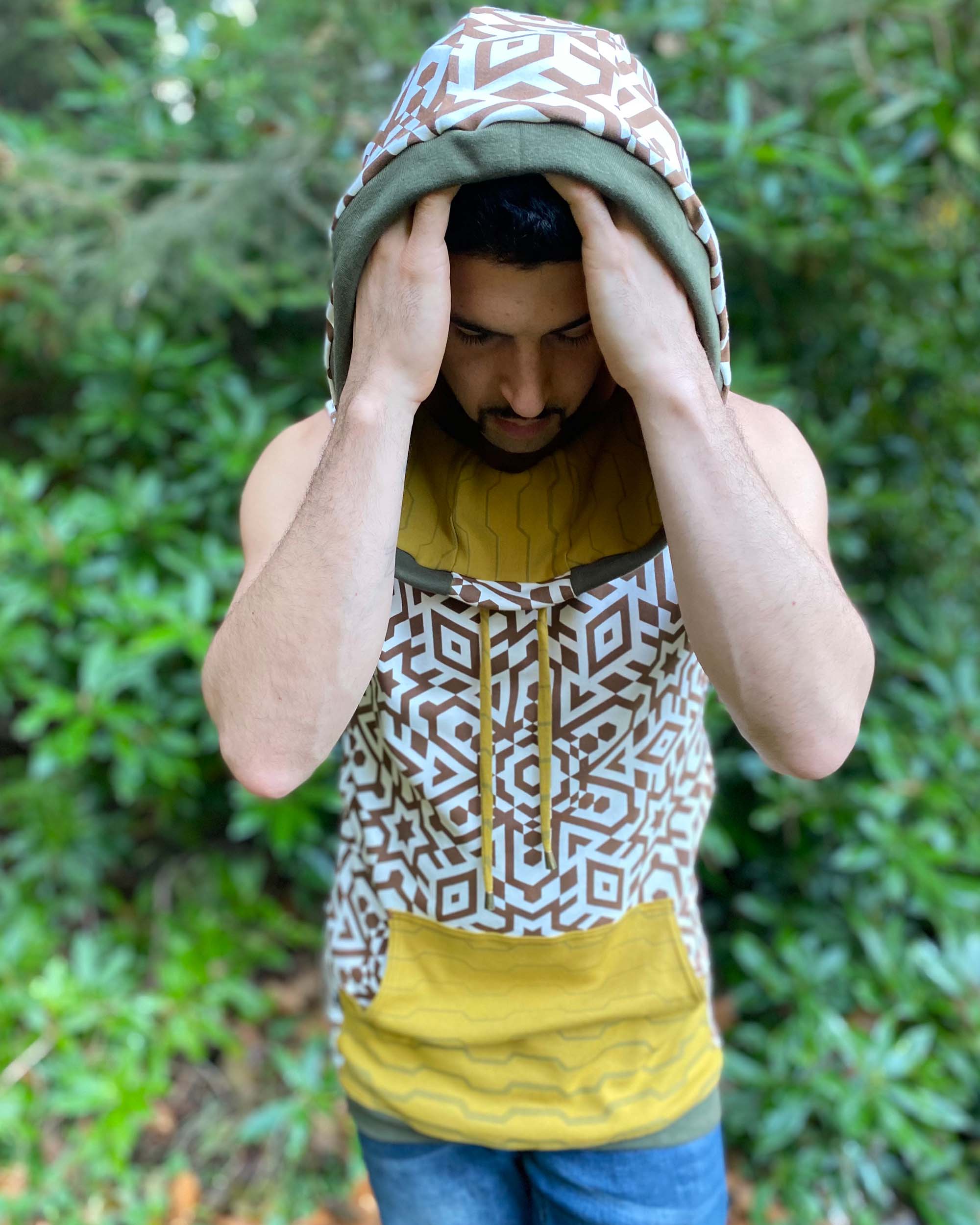 Organic cotton hooded tank top, undyed with brown geometric print, detail view of hood.