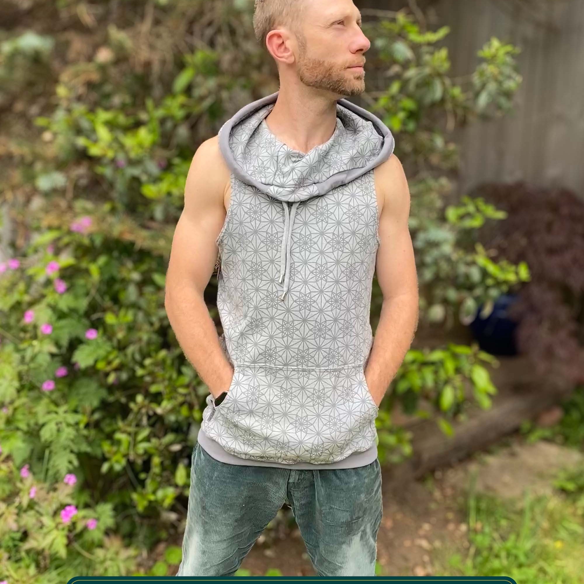 Organic cotton sleeveless hoodie, grey with geometric print, front view on male model.