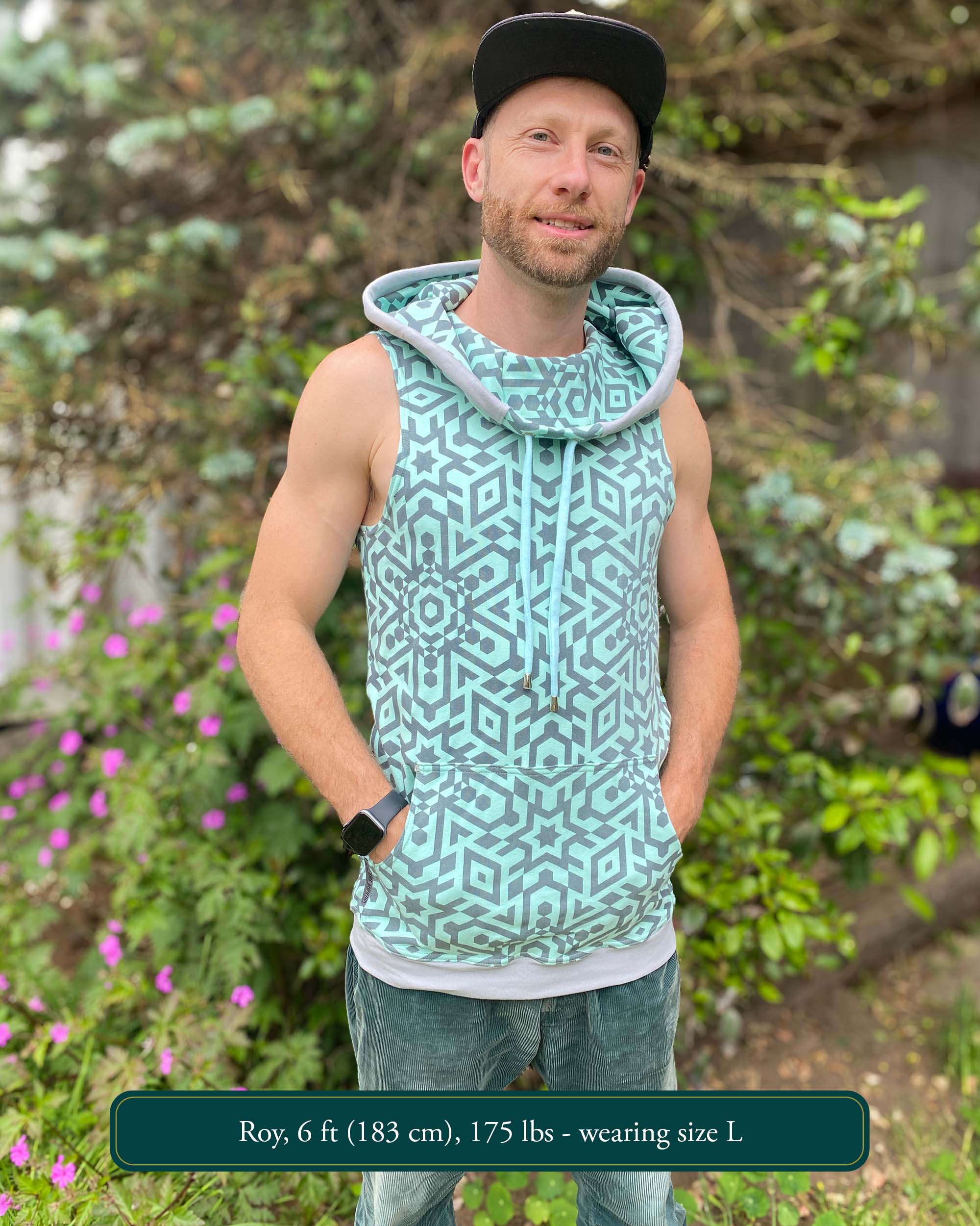 Organic cotton sleeveless hoodie, mint with geometric print fabric, front view on male model.