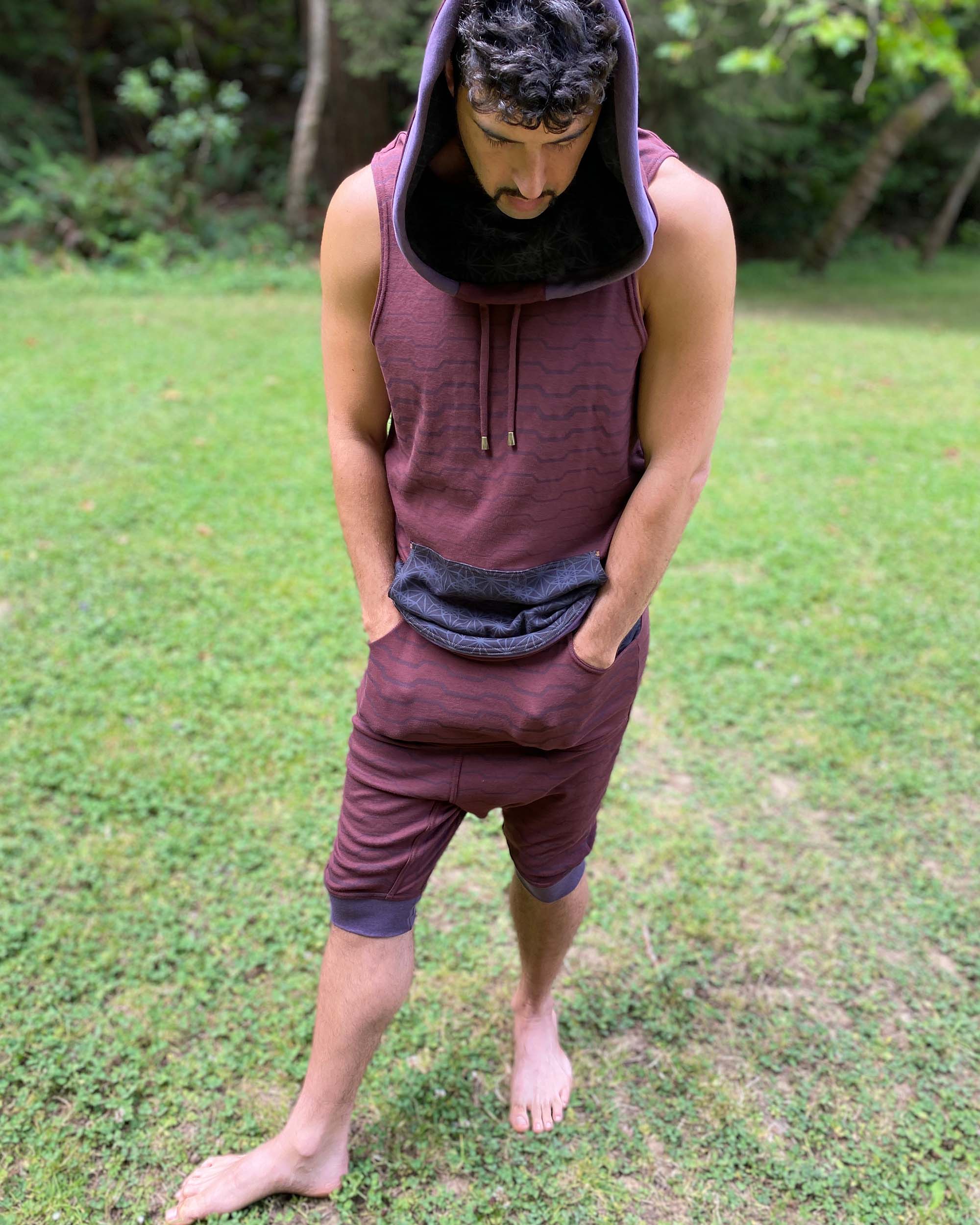 Organic cotton hooded tank top and matching shorts, brown with black accents and geometric print, front view.