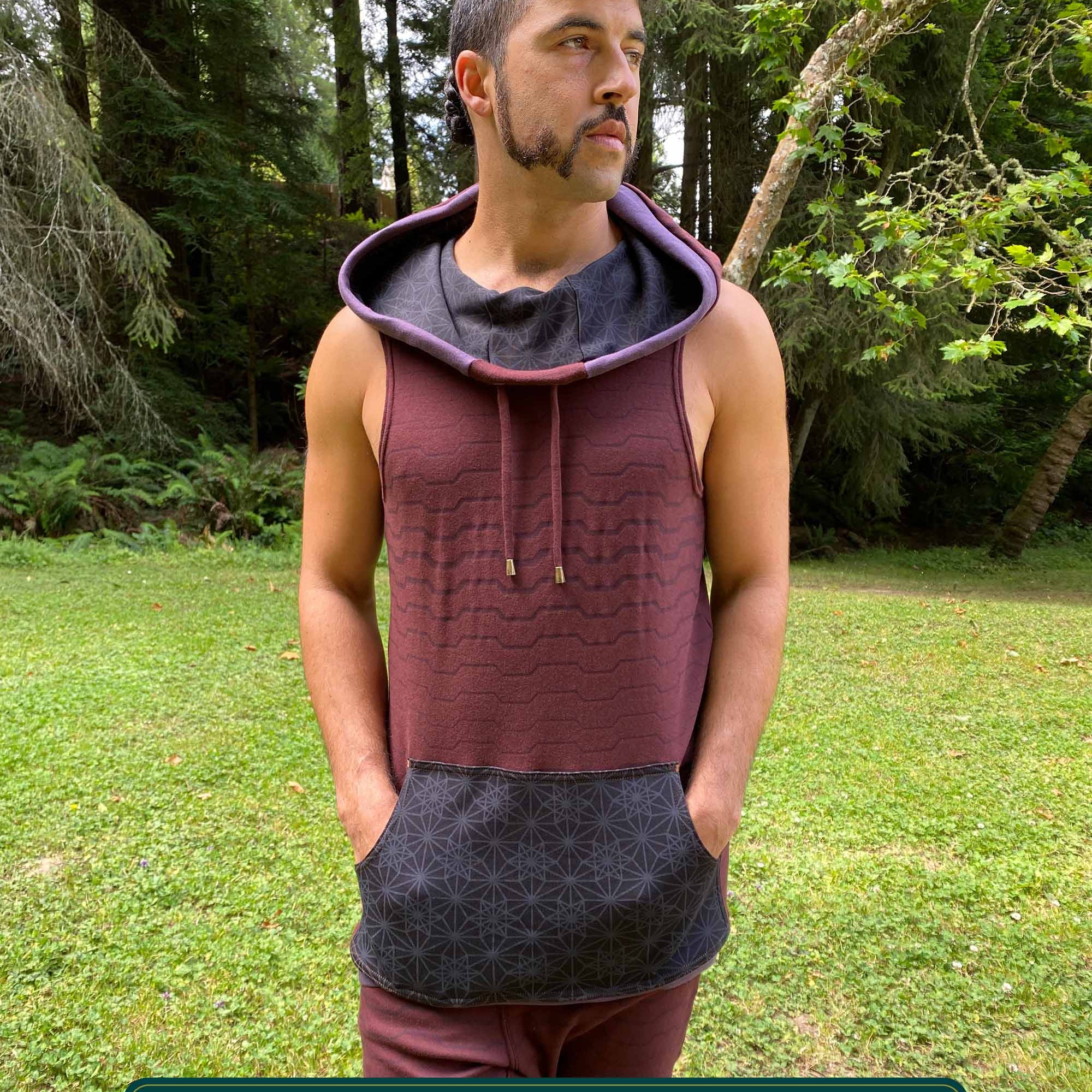 Organic cotton hooded tank top, brown with black accents and geometric print, front view on male model.
