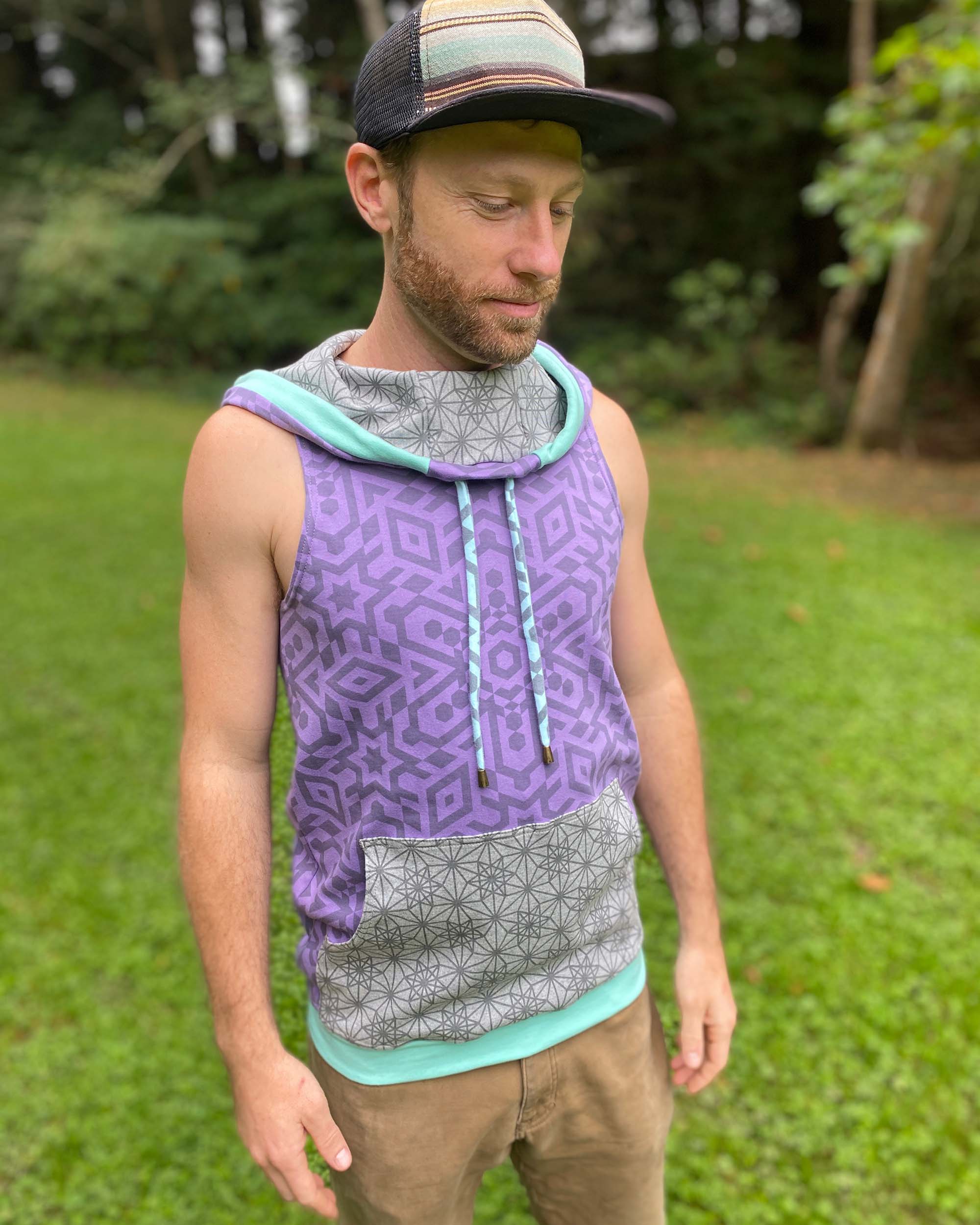 Organic cotton hooded tank top, lavender with geometric print, front detail view of fabric.