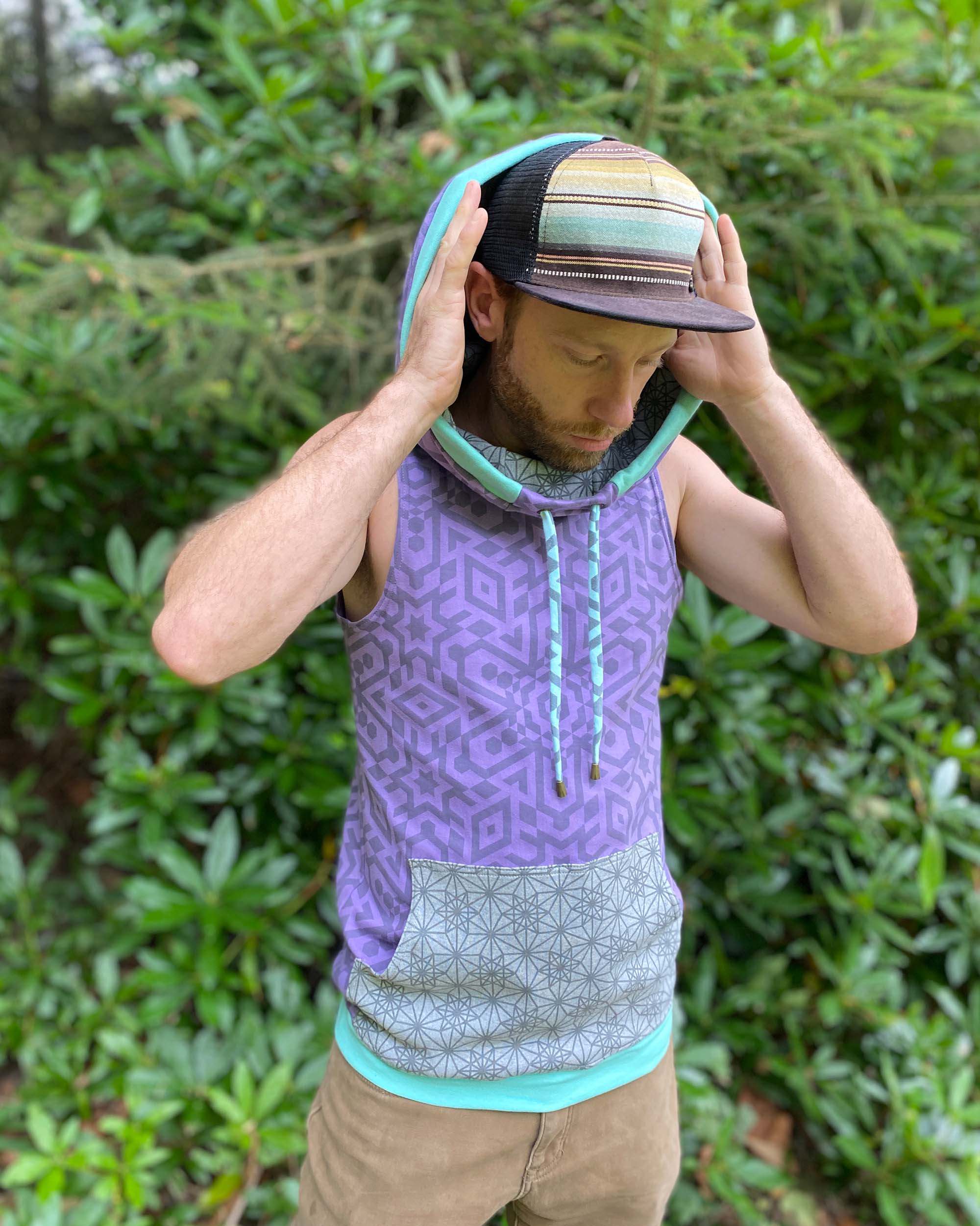 Organic cotton hooded tank top, lavender with geometric print and grey accents.