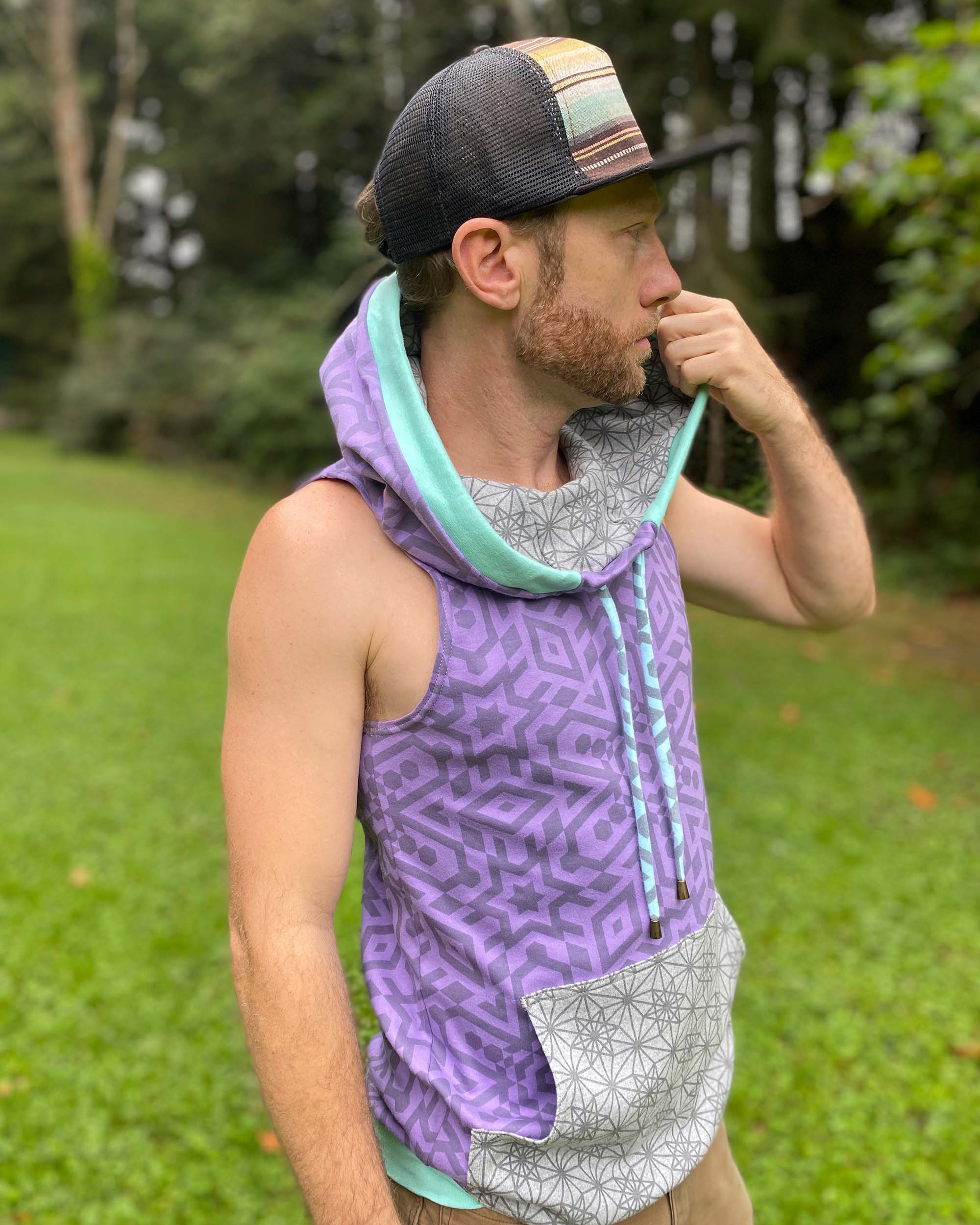 Organic cotton hooded tank top, lavender with geometric print and grey accents, right side view.