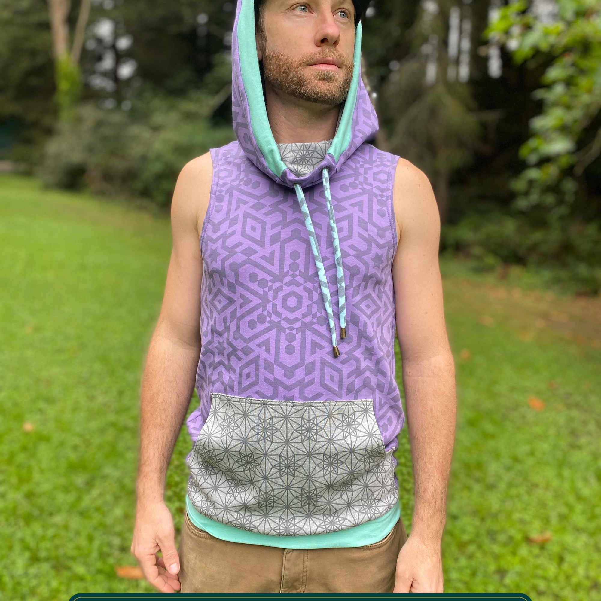 Organic cotton hooded tank top, lavender with geometric print fabric, front view on male model, hood up.