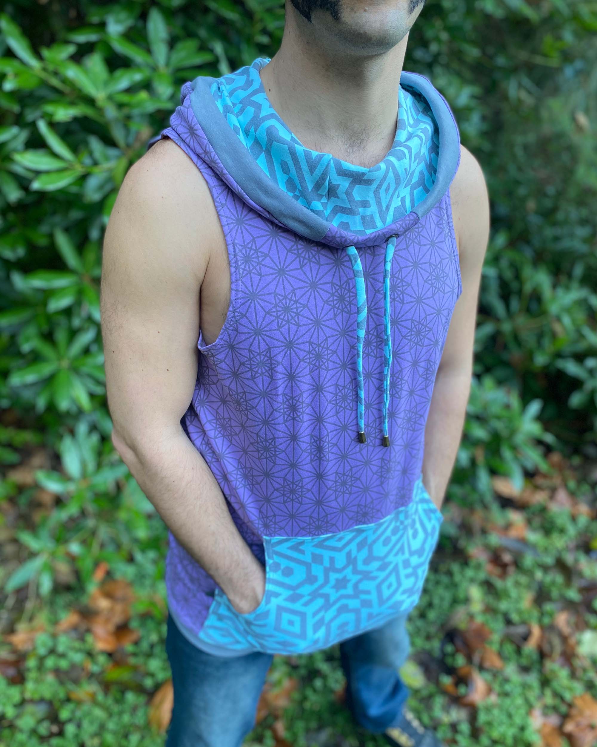 Organic cotton hooded tank top, lavender and mint fabric with geometric print, detail view of drawcord.