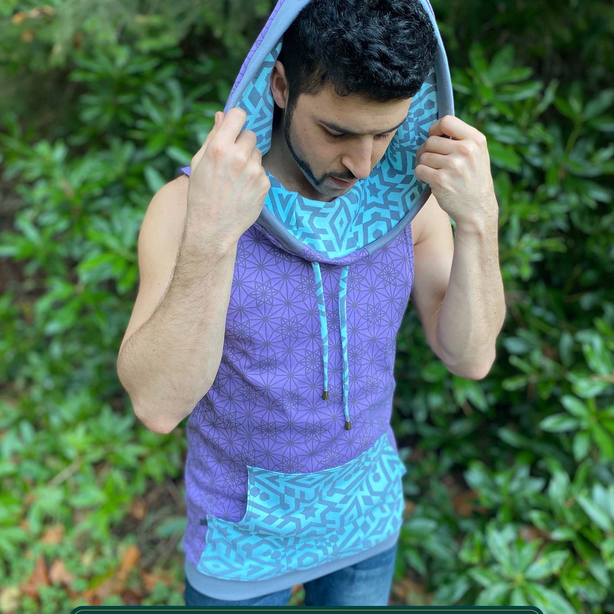Organic cotton hooded tank top, lavender and mint fabric with geometric print, top view of male model.