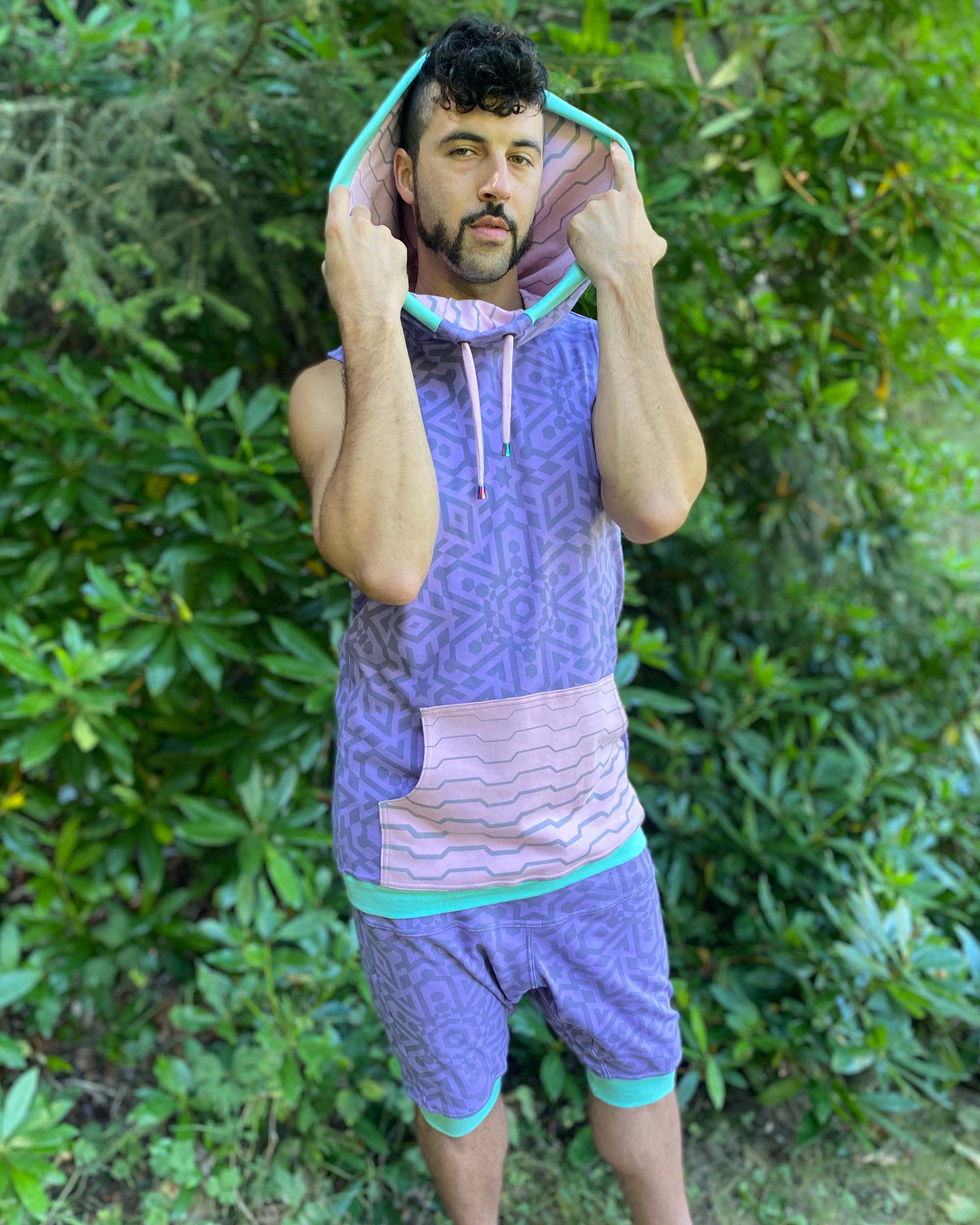 Organic cotton hooded tank top, lavender and pink geometric printed fabric, front view.