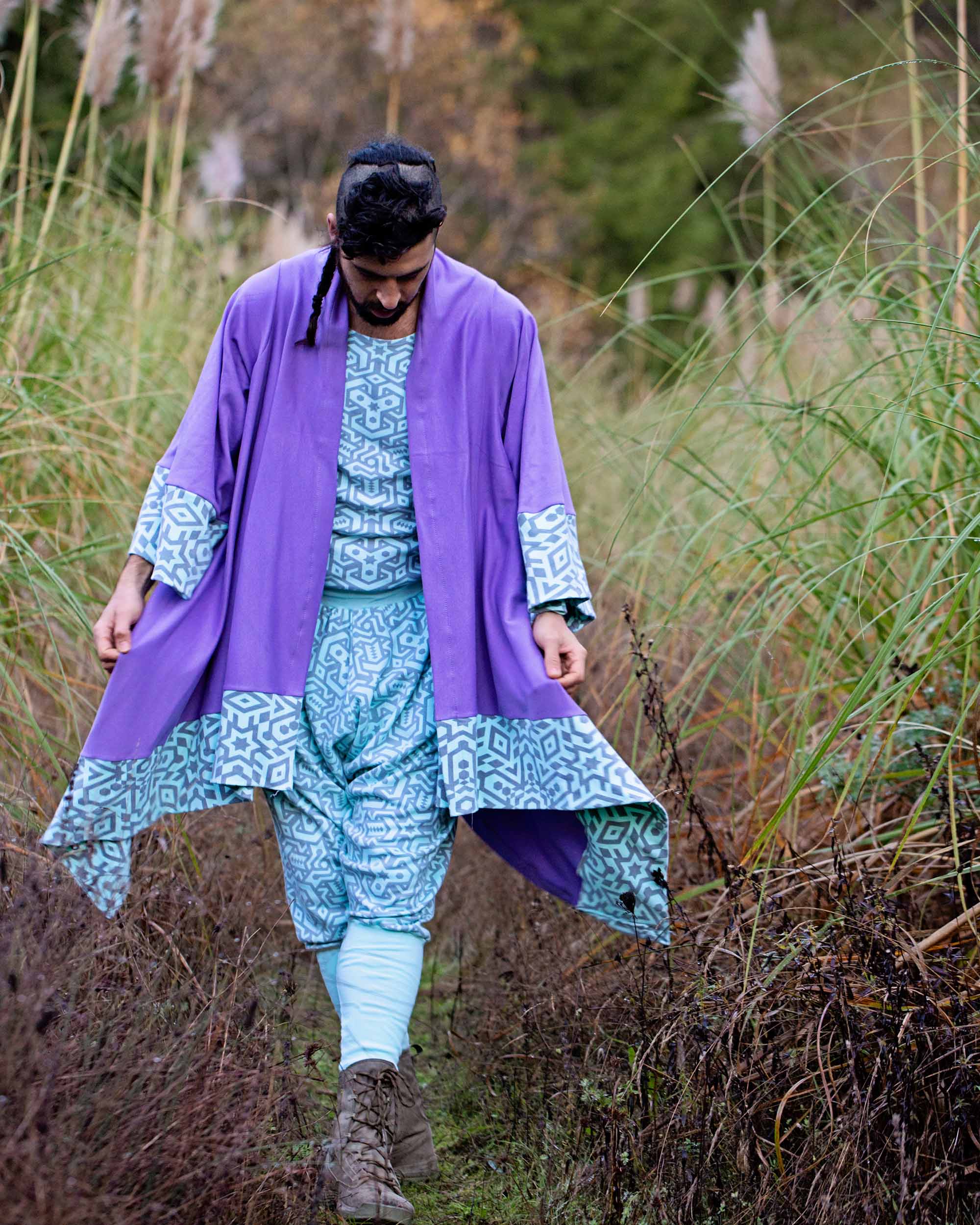 Organic cotton lavender kimono with geometric printed mint fabric accents, front view on male model in nature.