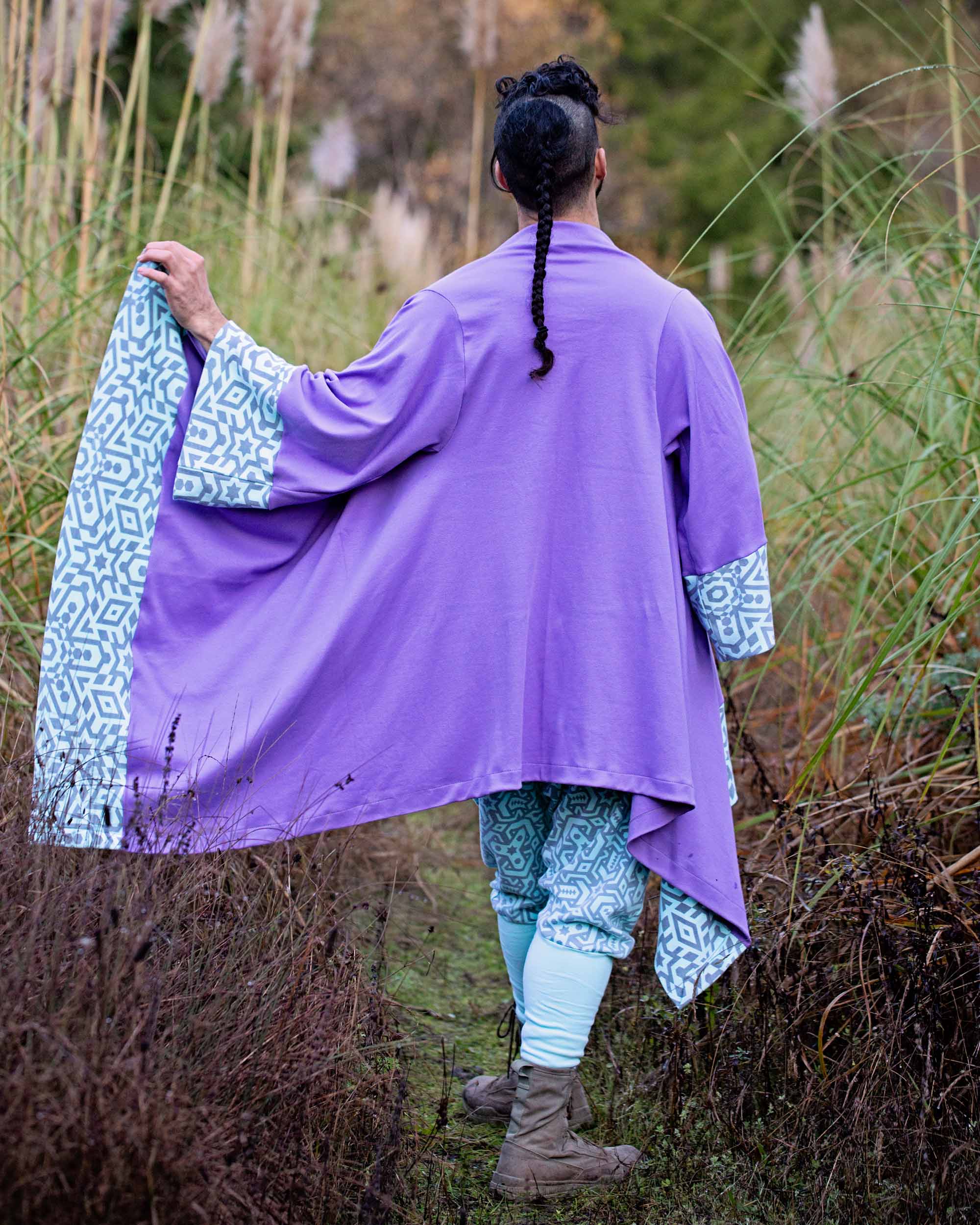 Organic cotton lavender kimono with geometric printed mint fabric accents, back view on male model.