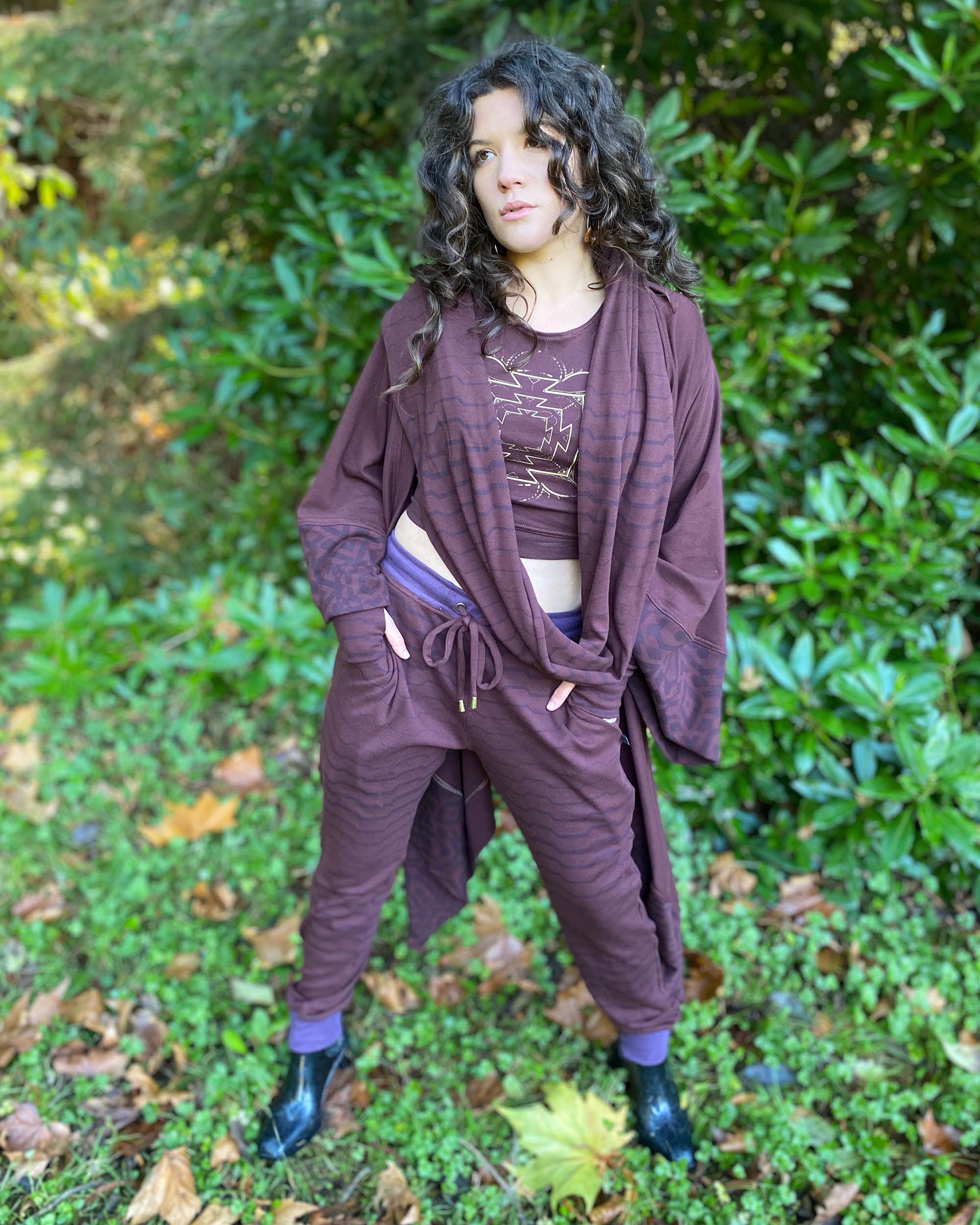 Organic cotton kimono, brown with geo printed fabric accents, front view on female model.