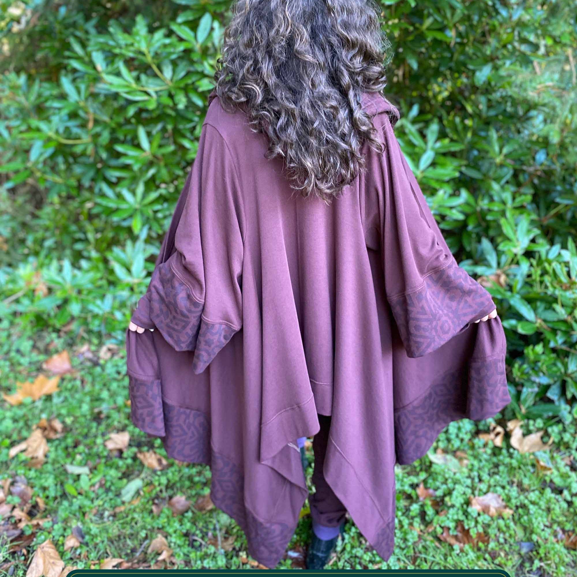 Organic cotton kimono, reddish brown with geometric fabric accents, back view on female model.