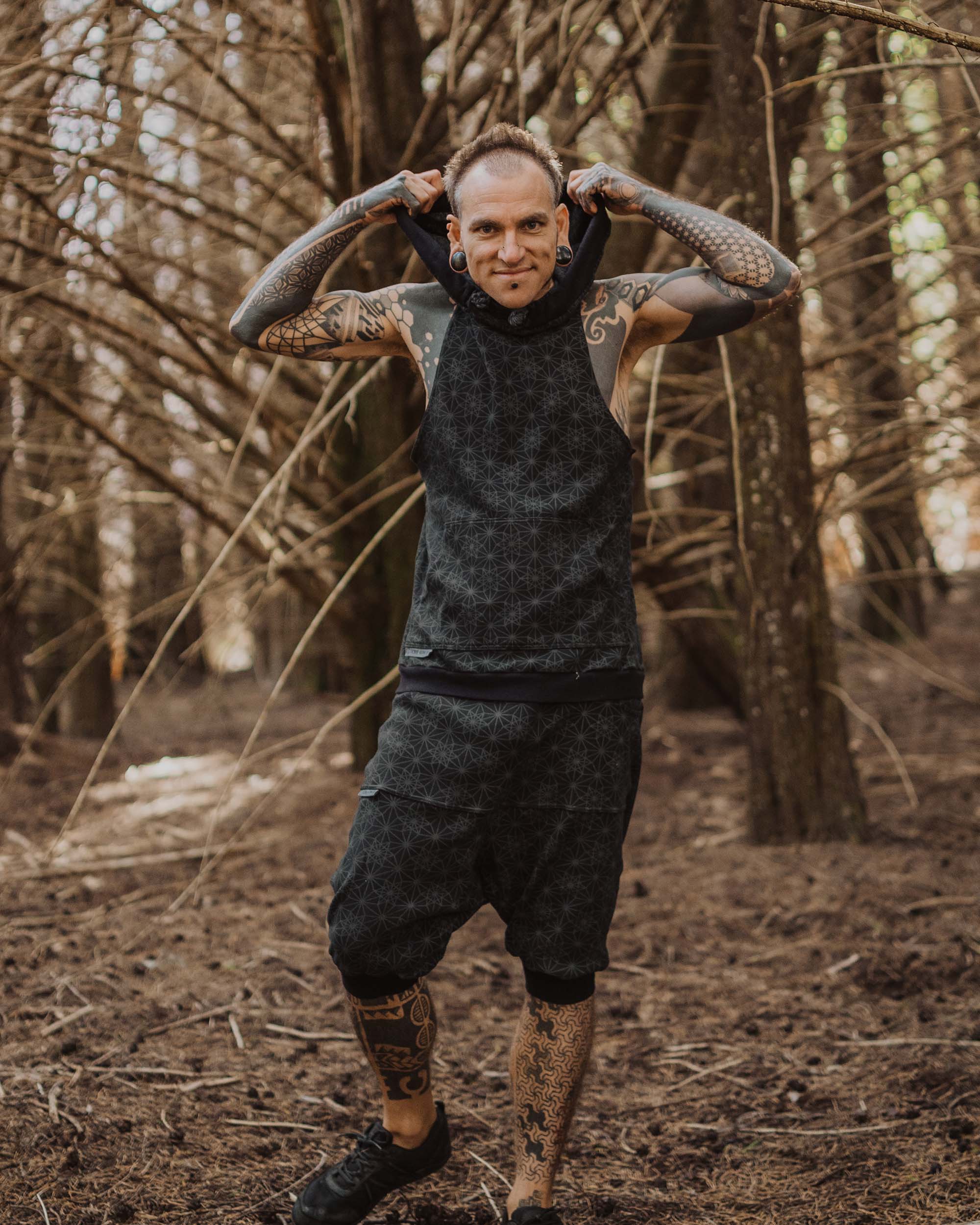 Organic cotton matching drop crotch shorts and hooded tank top, black with geometric fabric print.