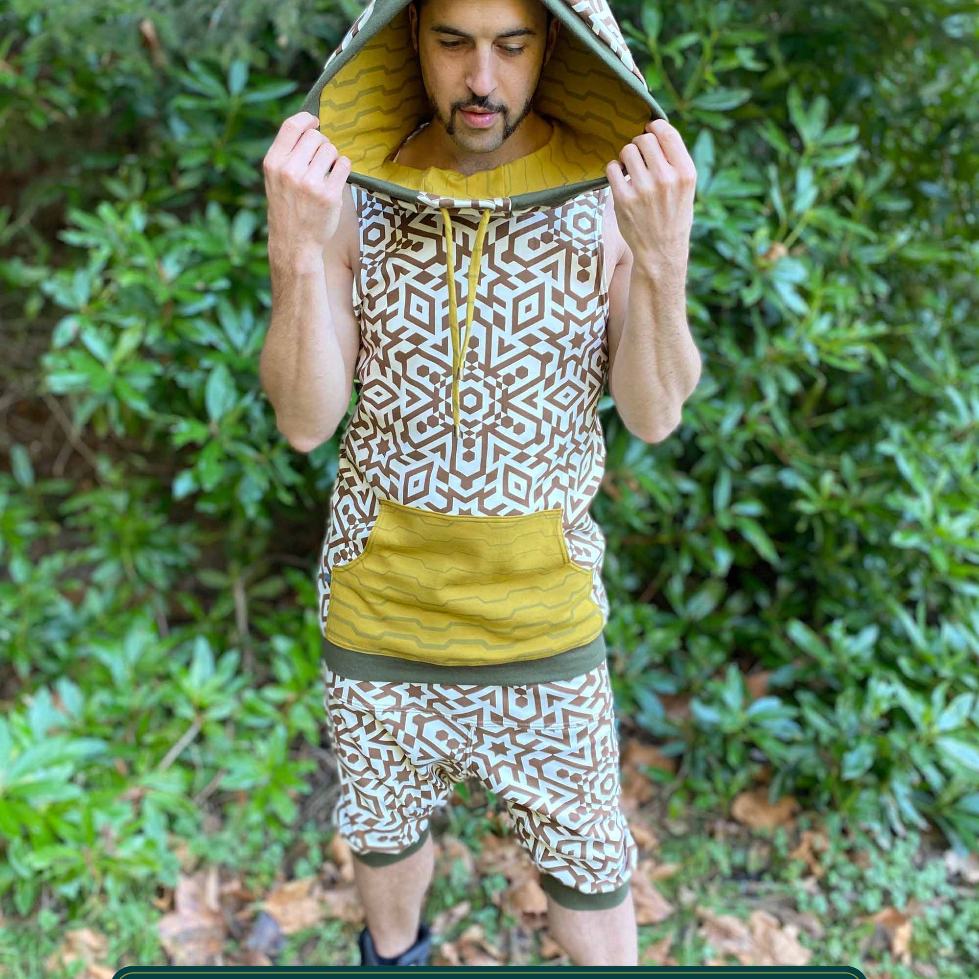 Organic cotton hooded tank top and shorts, un-dyed fabric with geometric print, full body view on model.