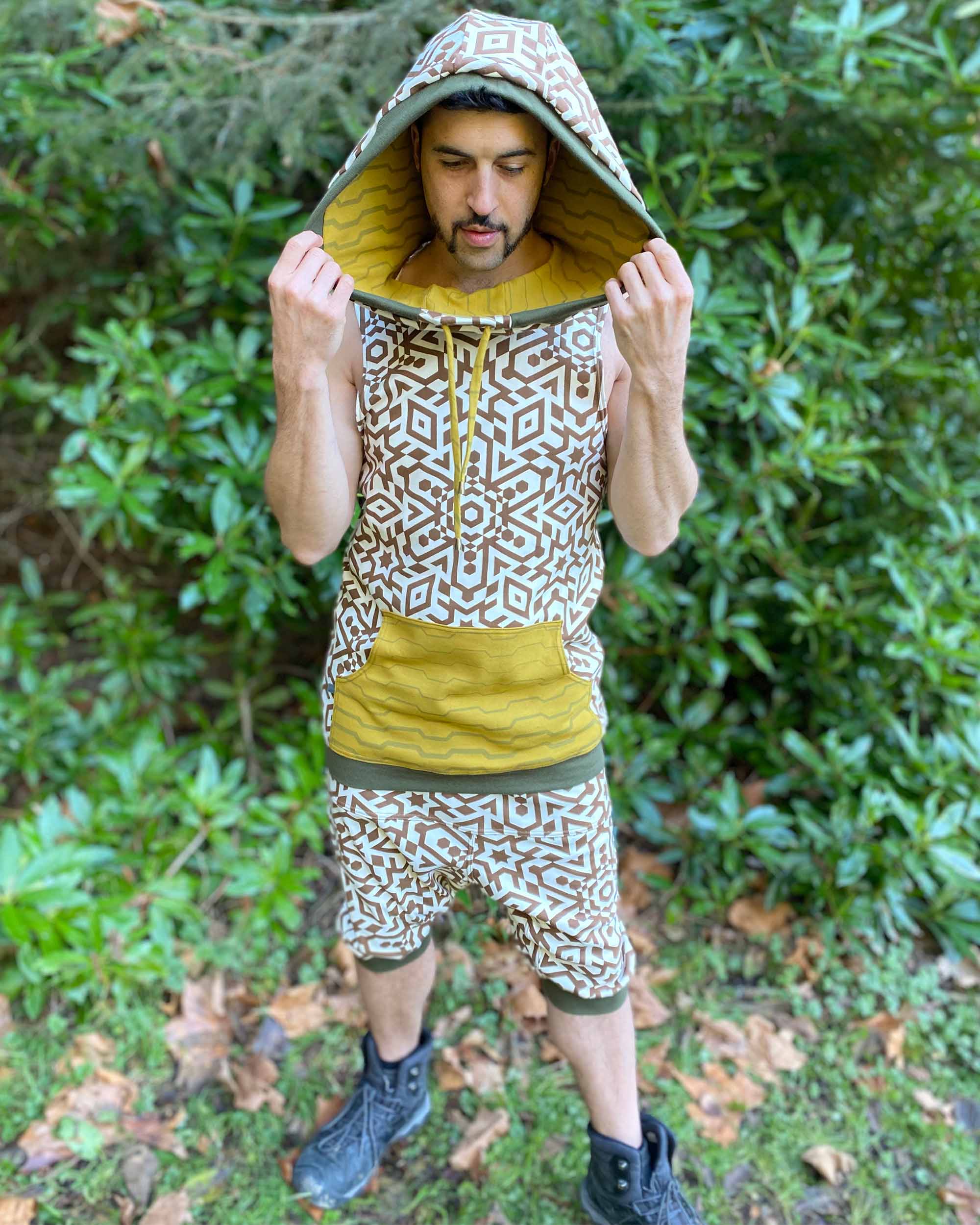 Organic cotton drop crotch shorts and matching hooded tank top, undyed fabric with geometric print.