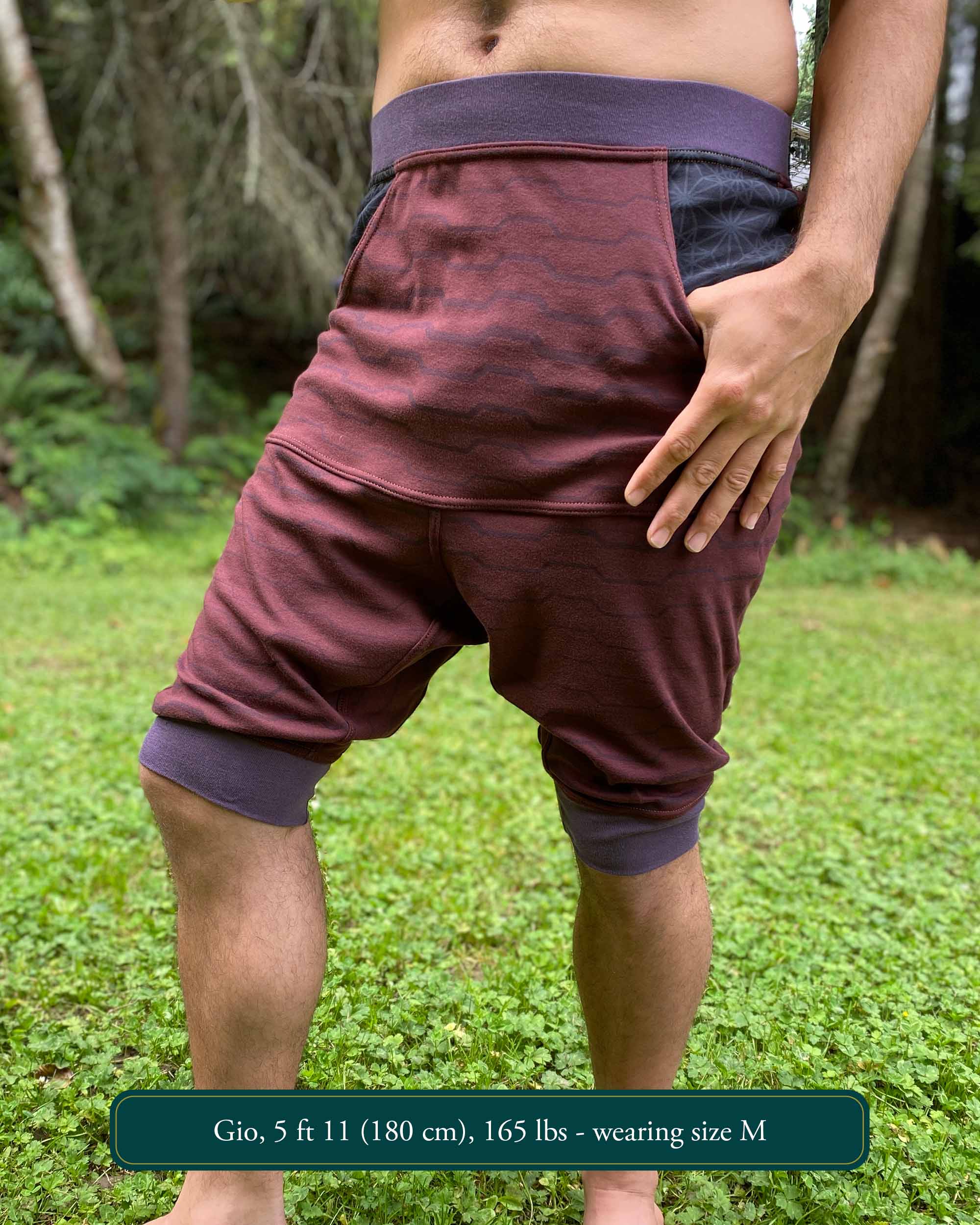 Organic cotton drop crotch shorts, brown fabric with geometric print, right side view on male model.