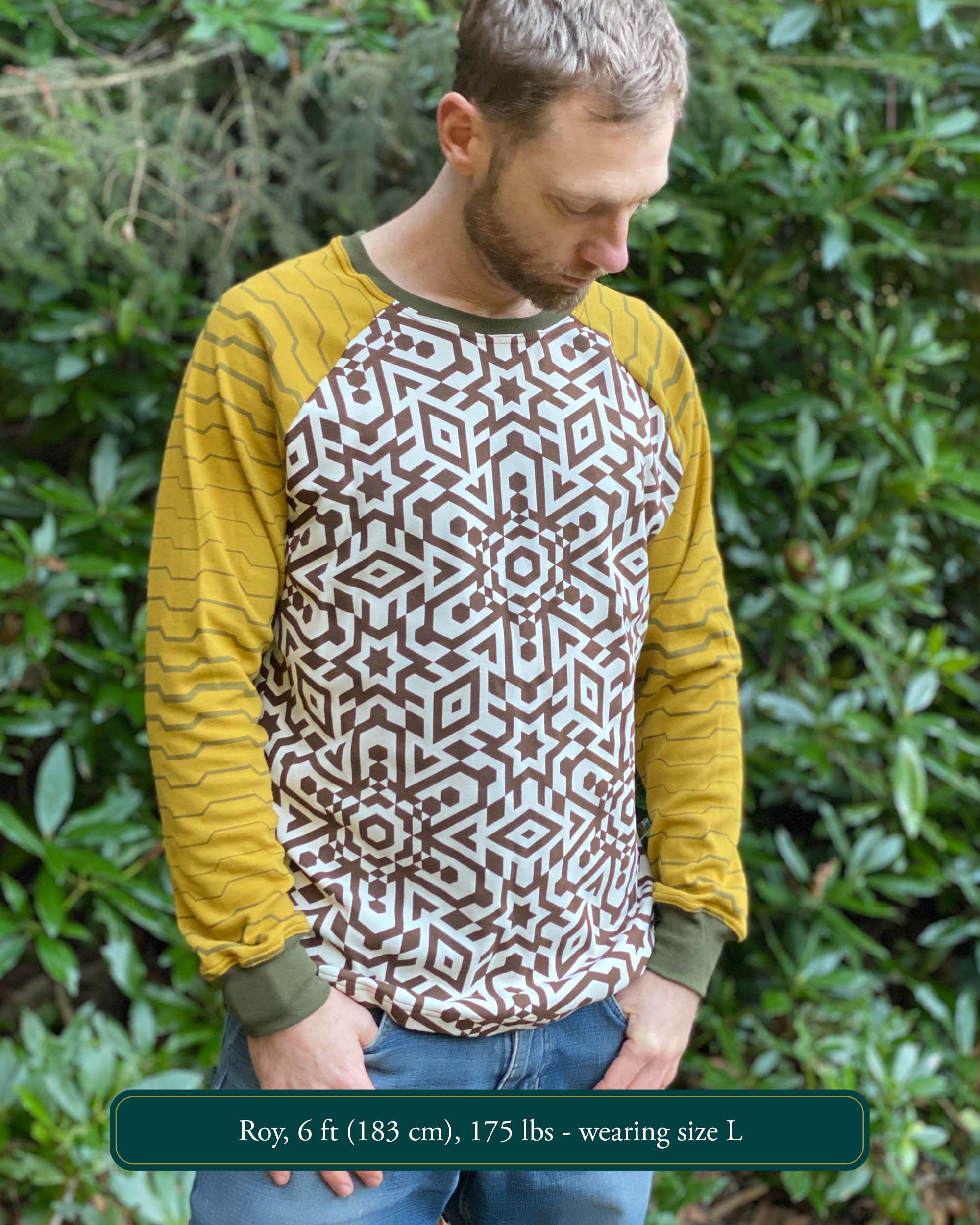Organic cotton long sleeve shirt, undyed torso with yellow geometric striped sleeves, front view on model.