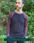 Organic cotton long sleeve shirt, black with brown geometric accent fabric, front view on male model.