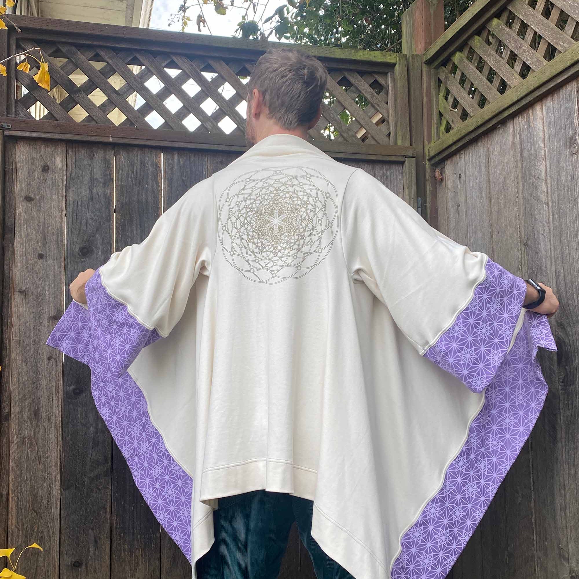 Organic cotton kimono, undyed with lavender geometric printed accent fabric with gold sacred geometry print.