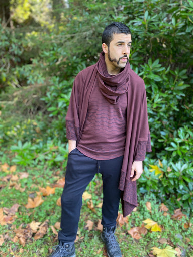 Stylish Man wearing organic cotton clothing in brown and black colors screen printed sacred geometry designs