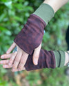 Organic cotton hand warmers reddish brown colored fabric with geometric print and green accents, top detail view.