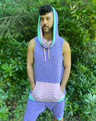 Organic cotton hooded tank top and shorts, lavender fabric with geometric print, front left side view on model.