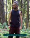 Organic cotton mens tank top, black  fabric, front view on model.
