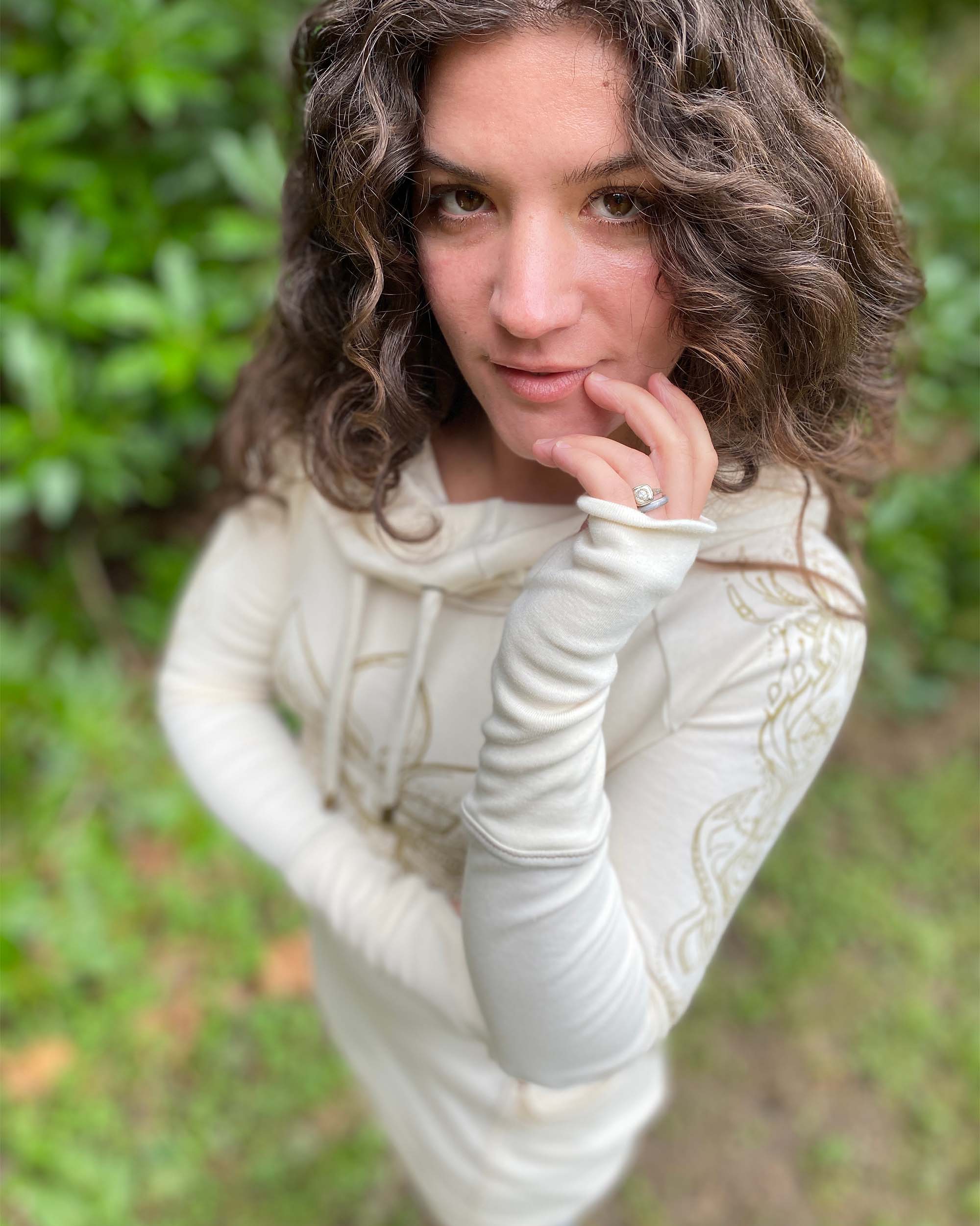 Organic cotton fitted tunic dress, undyed fabric with gold lotus design, detail view of thumbhole cuff.