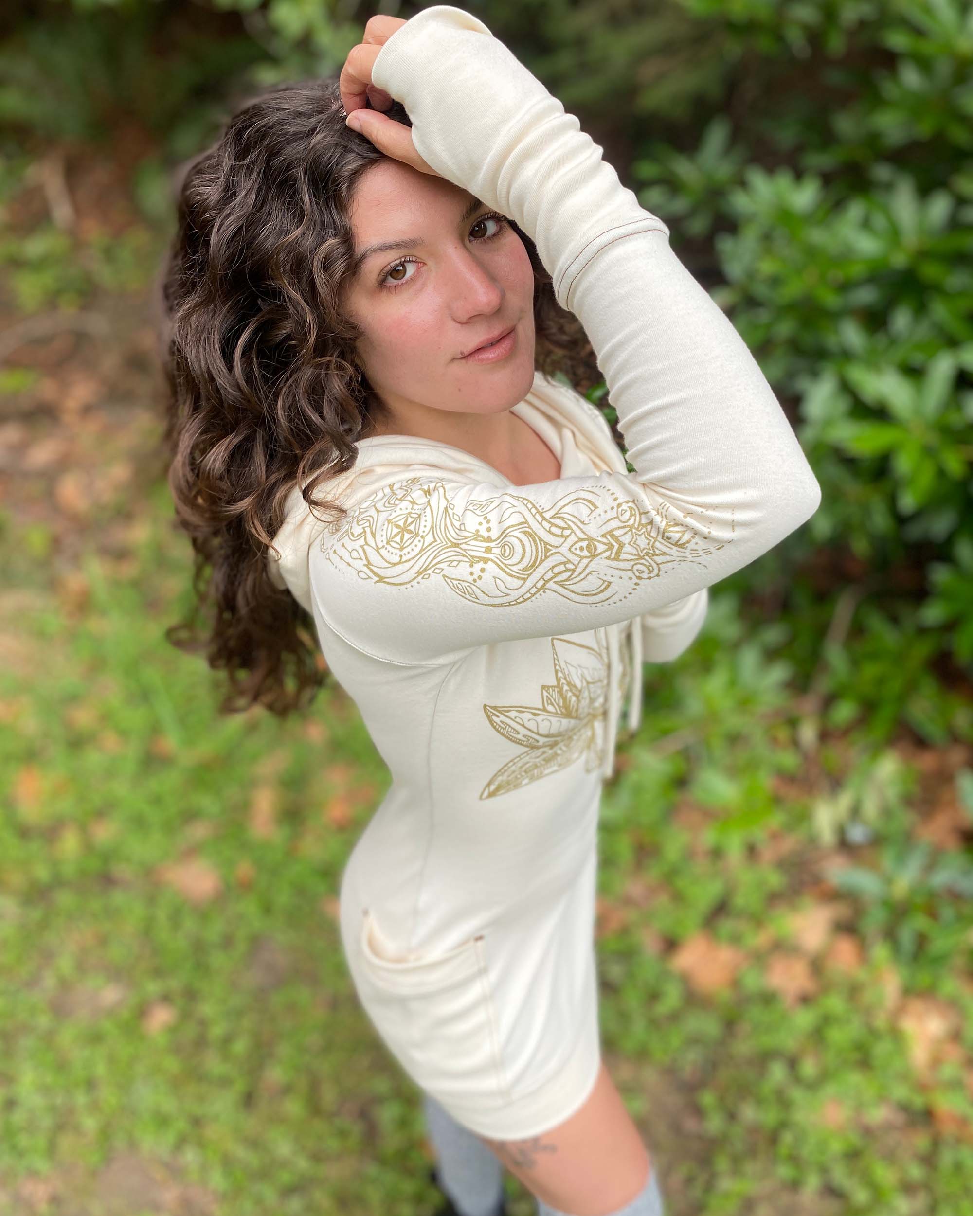 Organic cotton long sleeve tunic dress, undyed fabric with front gold lotus print, detail view of right sleeve.