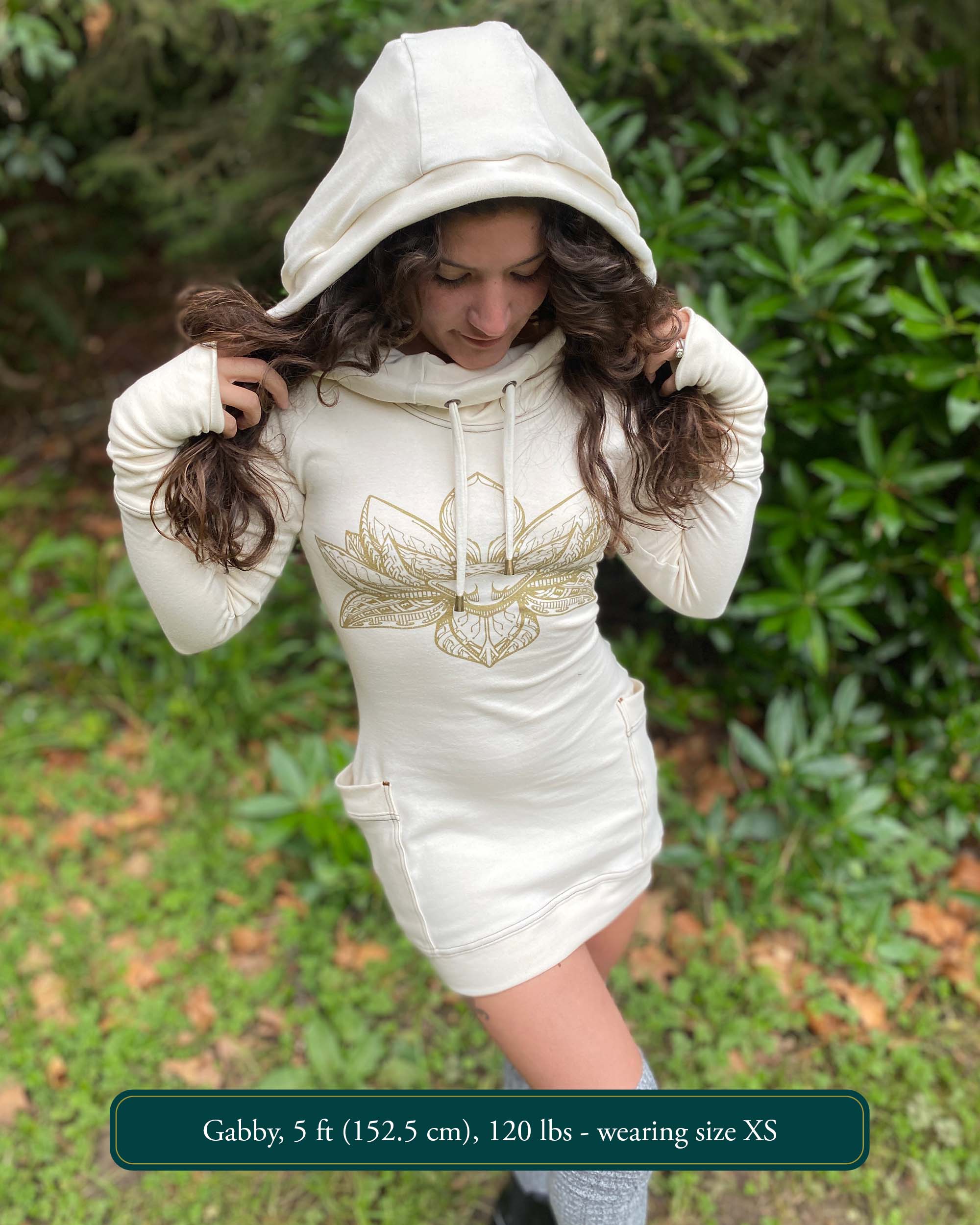 Organic cotton long sleeve tunic dress, undyed fabric with front gold lotus print, worn by female model.