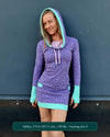 Organic cotton fitted tunic dress, lavender with geometric print, front view on female model.