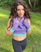 Organic cotton fingerless gloves and crop top in lavender fabric and geometric print, front view of female model.