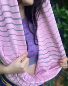 Organic cotton infinity scarf, pink fabric with geometric stripes, detail view of fabric.