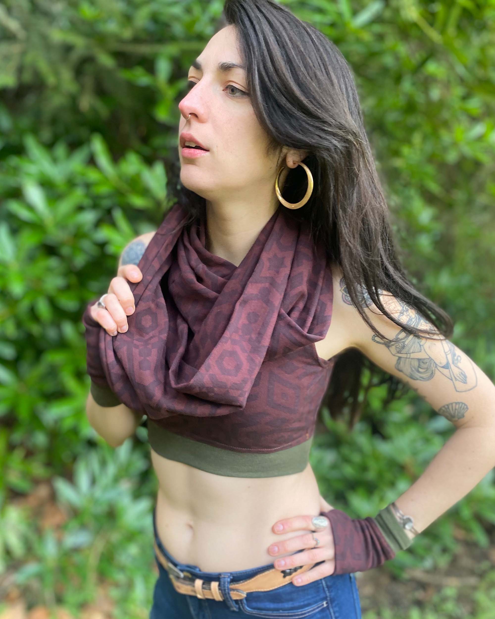 Organic cotton infinity scarf, brown fabric with sacred geometry print, right view on female model.