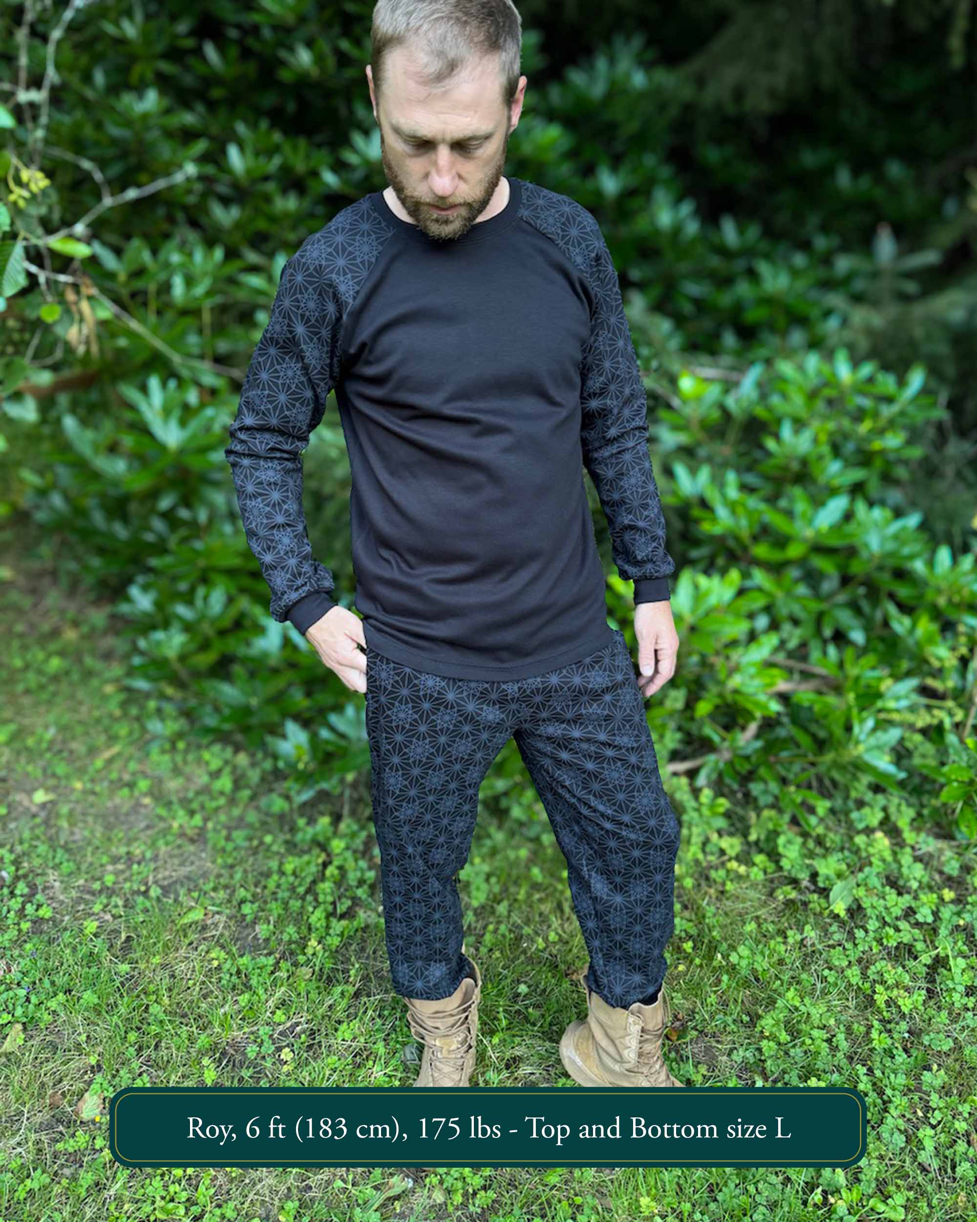 Men's matching joggers and long sleeve shirt, black with geometric printed fabric, male modeled.