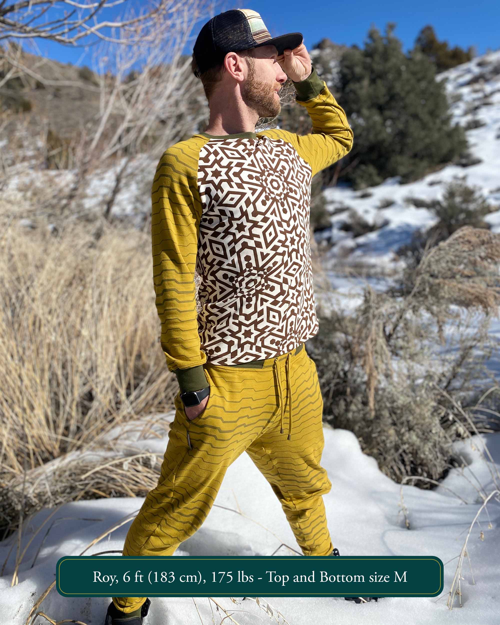 Men's matching 2 piece set, joggers and long sleeve shirt, yellow with geometric stripe accents, front right side view on model.