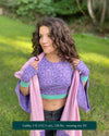 Organic cotton crop top, lavender fabric with sacred geometry print, front view on female model.