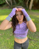 Organic cotton crop top, lavender fabric with sacred geometry print, front view on short female model.