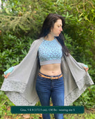 Organic cotton crop top, mint colored fabric with grey sacred geometry print on female model.