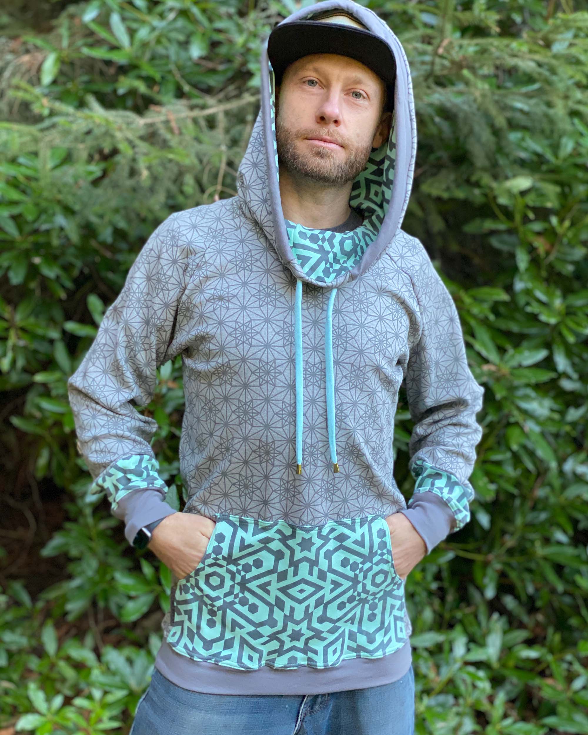 Organic cotton extra long unisex hoodie, grey fabric with sacred geometry all over screen print.