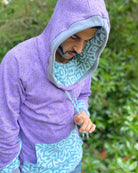 Organic cotton hoodie, lavender and blue fabric with geometric print, detail  view on male model.