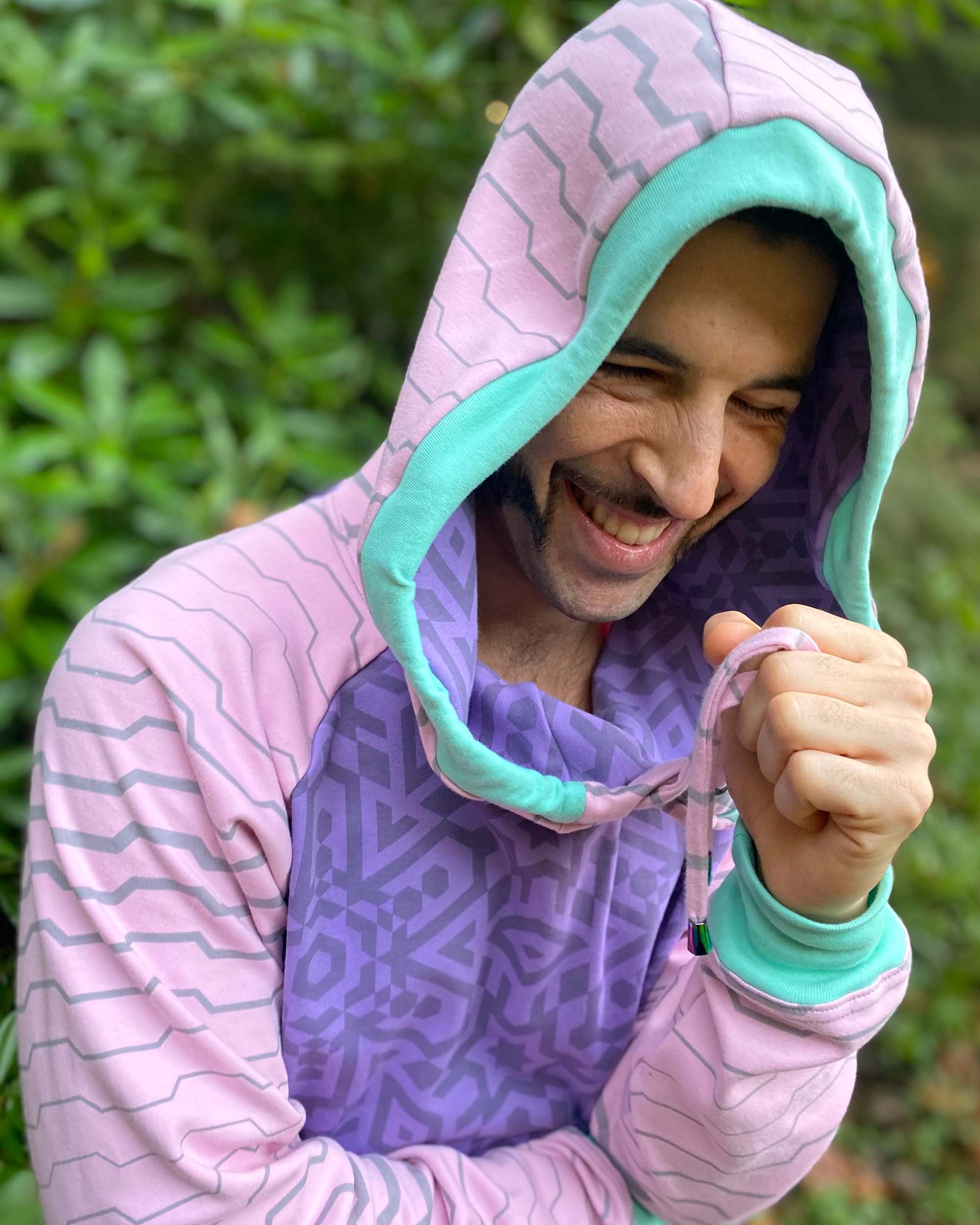 Organic cotton hoodie, lavender and pink fabric with geometric print, close up  view of hood.