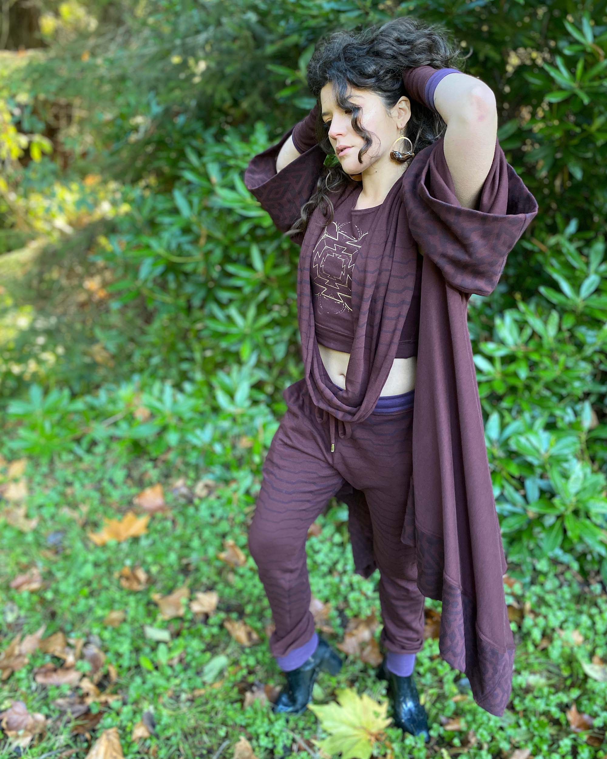 Organic cotton kimono, brown with geo printed fabric accents, left side view on female model.