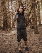 Organic cotton matching drop crotch shorts and hooded tank top, black with geometric fabric print, front view.