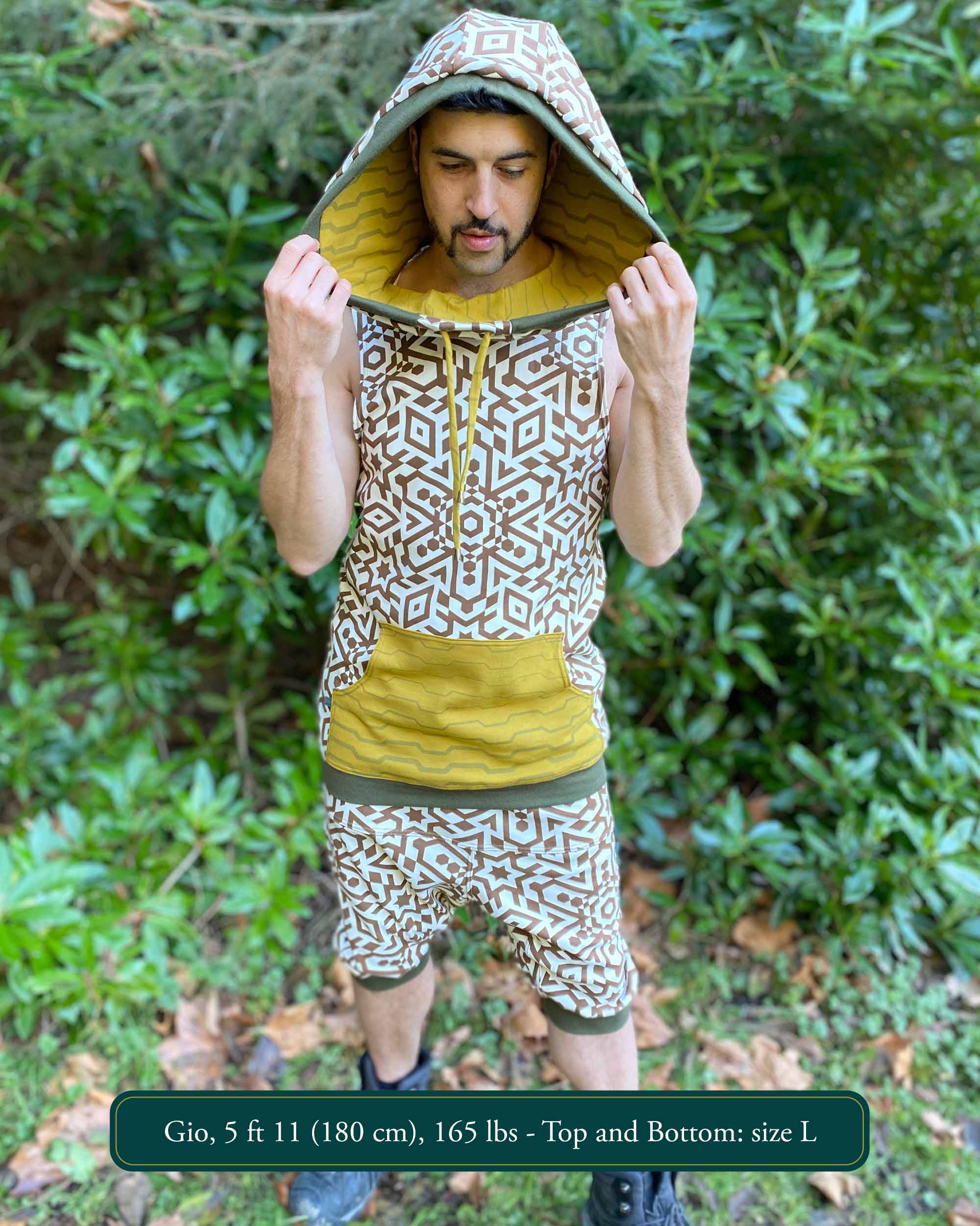 Organic cotton hooded tank top and shorts, un-dyed fabric with geometric print, full body view on model.