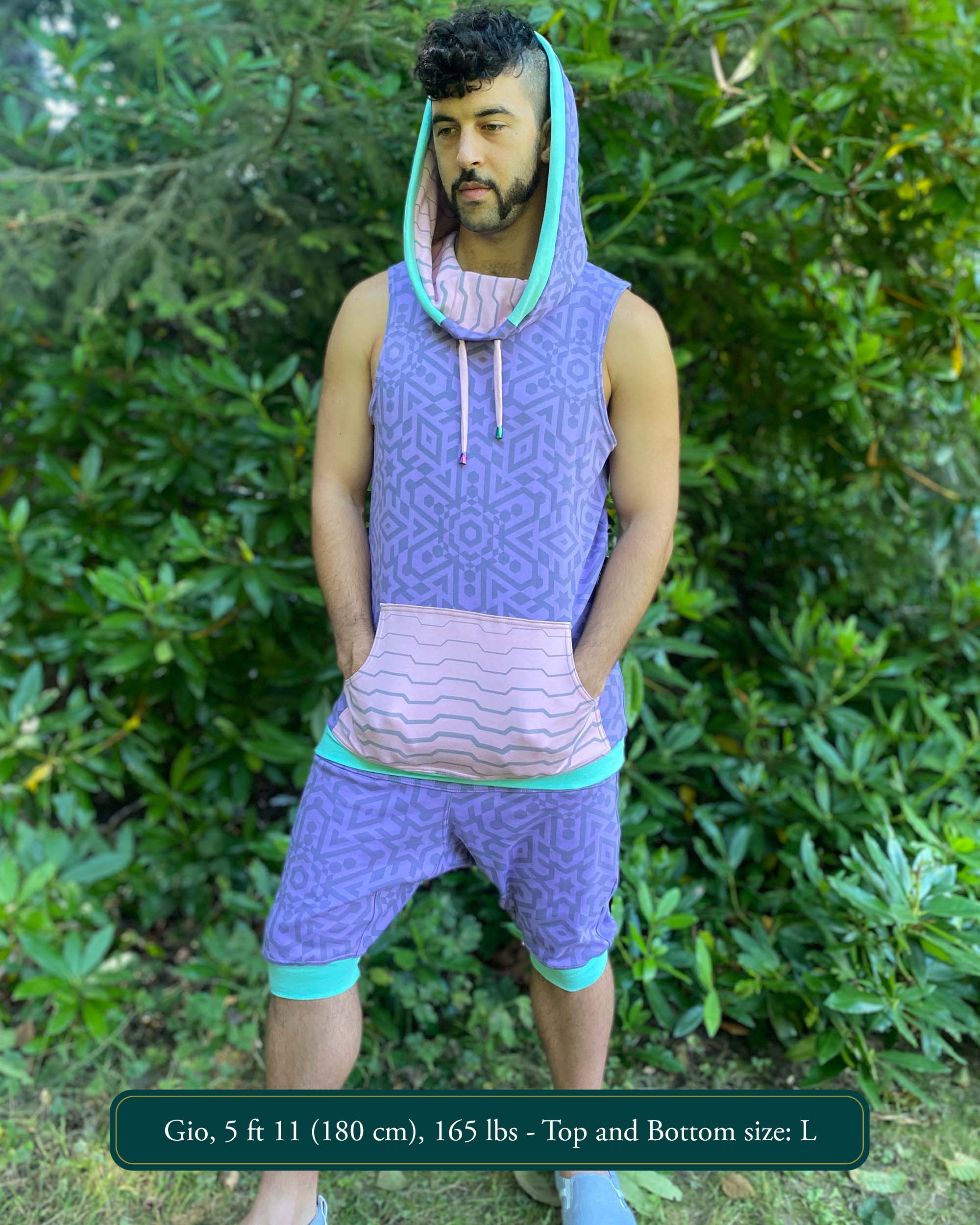 Organic cotton hooded tank top and shorts, lavender fabric with geometric print, full body view on model.